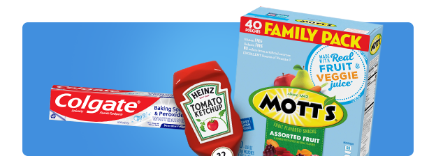 Colgate toothpaste next to ketchup and fruit snacks.