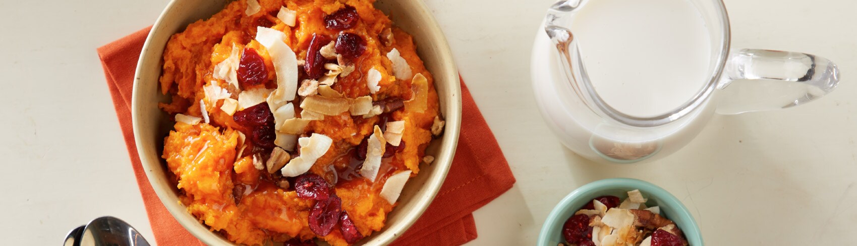 Sweet potato mash with raisins in a bowl