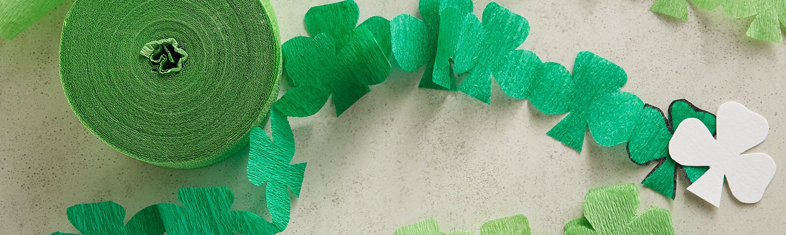 Green paper garland streamers cut into shamrock shapes Green paper garland streamers cut into shamrock shapes