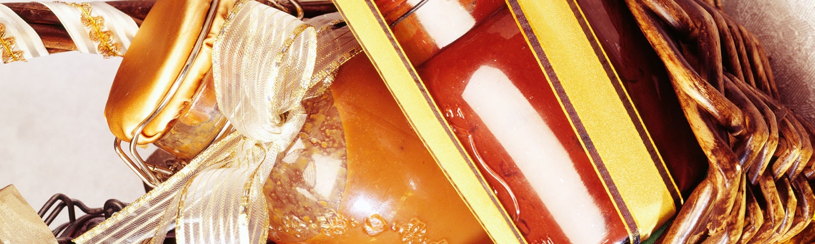 decorative jars of sauce in a basket