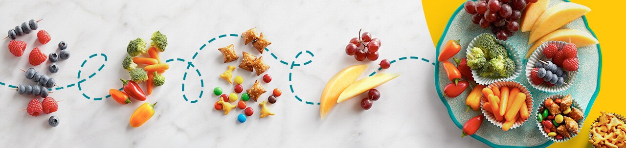 Snack Board Ideas: berries, veggies, candy, and chips