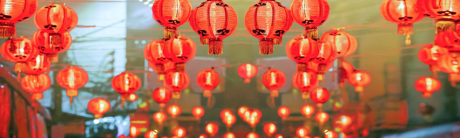 Chinese red lanterns lighten up across a marketplace